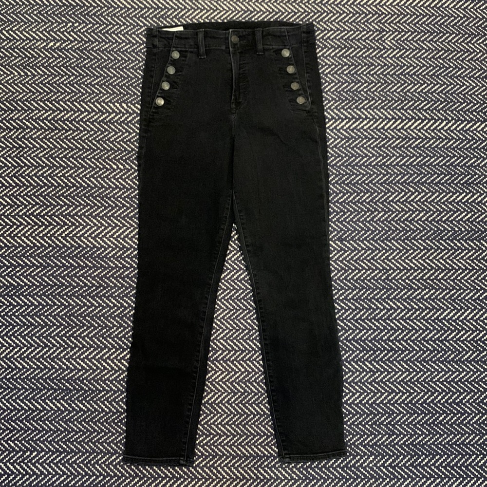 Black jeans with button details